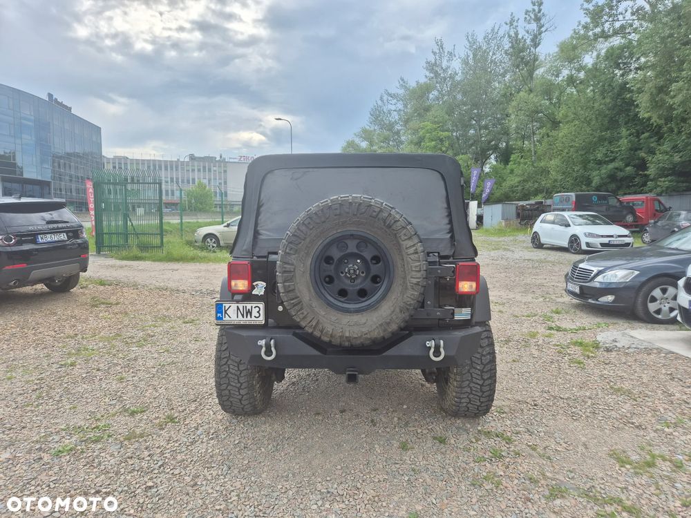 Jeep Wrangler Unlimited 3.8 Sport - 4