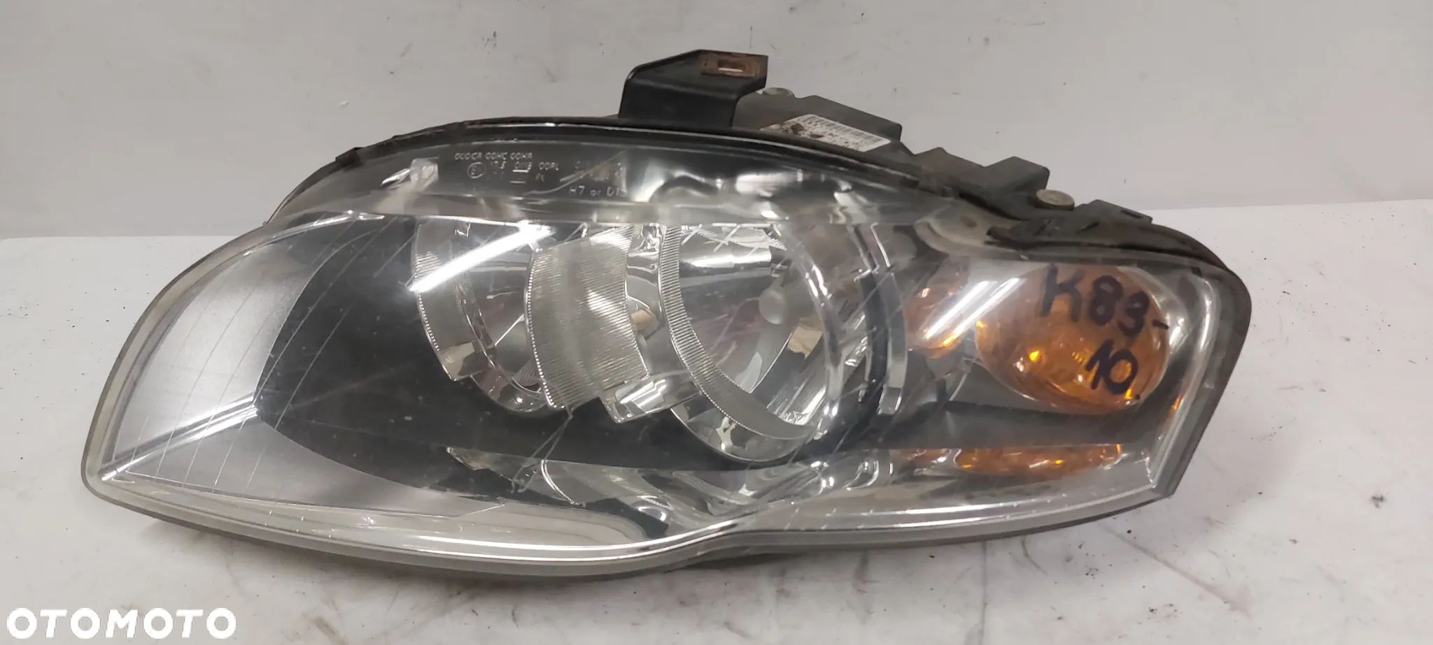 .  LAMPA PRZOD PRZEDNIA LEWA AUDI A4 B7 - 1