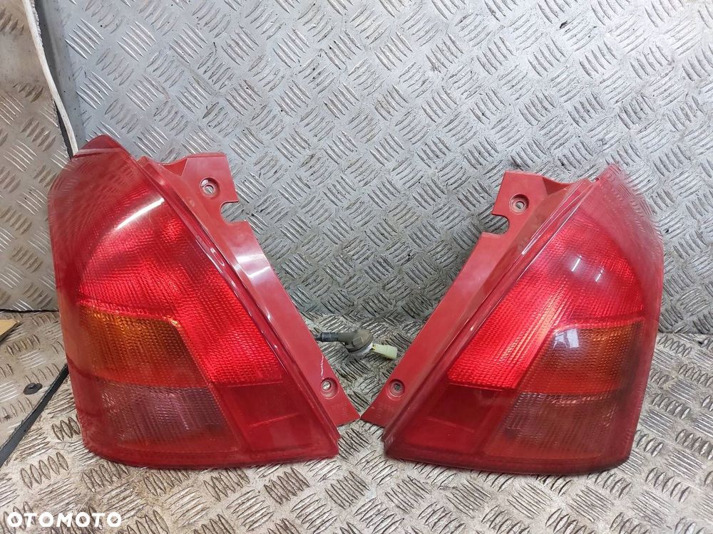LAMPA LEWY TYŁ + PRAWY TYŁ SUZUKI SWIFT IV HB 5D 04-10  TYC - 1