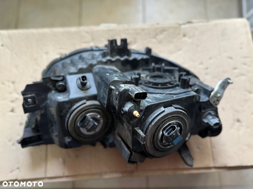 Reflektor / lampa przód przednia lewa Mitsubishi L200 - oryginalna - 2