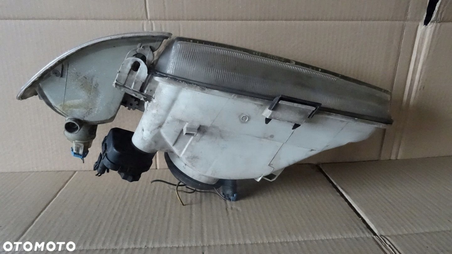 ASTRA 1 I F REFLEKTOR PRAWY PRZÓD 90383783 - 4