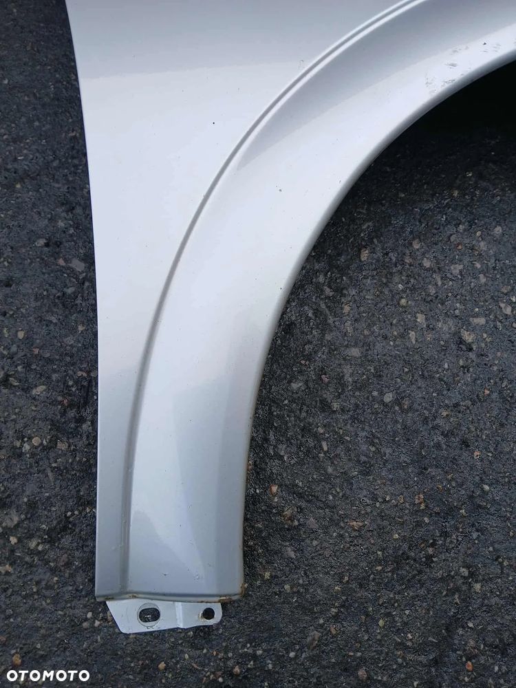 Opel Astra II G  Błotnik prawy kod lakieru Z147 - 4