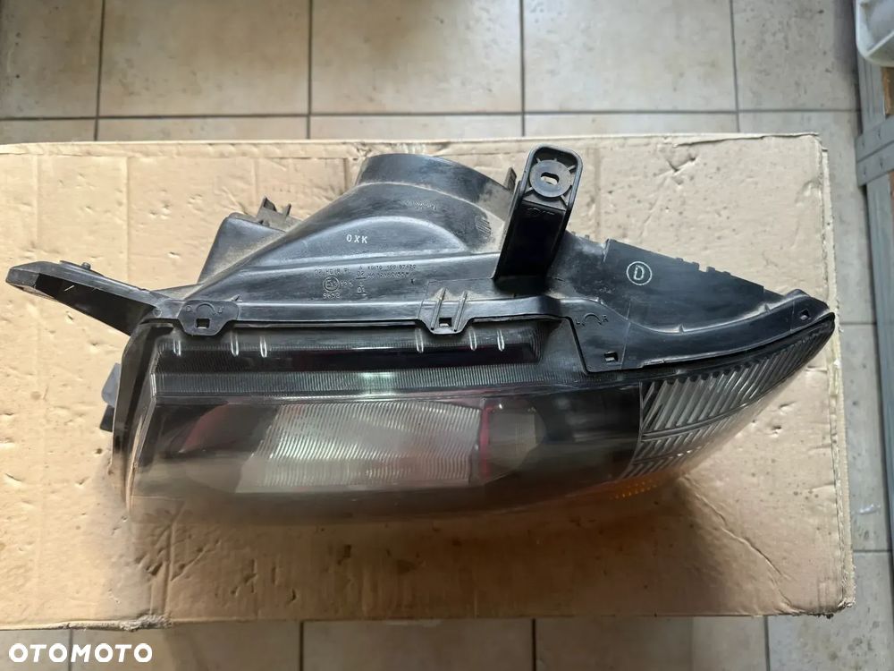 Reflektor / lampa przód przednia lewa Mitsubishi Pajero III 99-06'  BLACK - oryginalna - 2