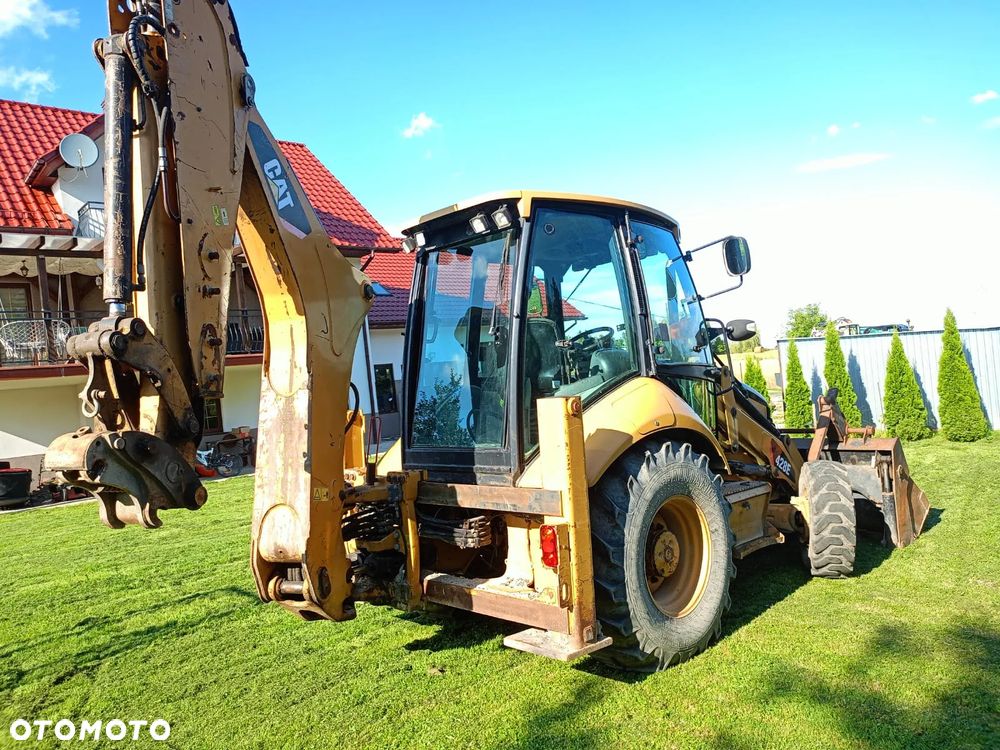 Caterpillar 428 e - 7