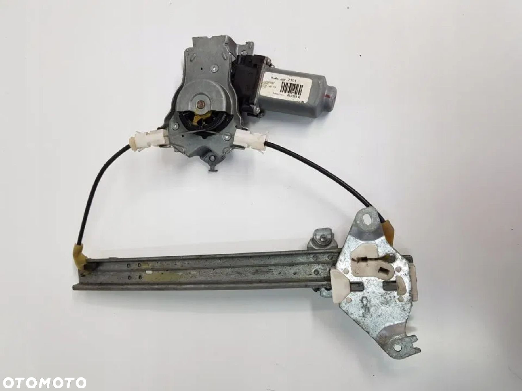 PODNOŚNIK SZYBY MECHANIZM LEWY TYŁ QASHQAI J10 I - 2