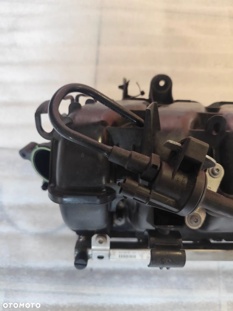 Kolektor Ssący Opel Astra Corsa D A12XER A14XER Nr 55562260RZ - 2