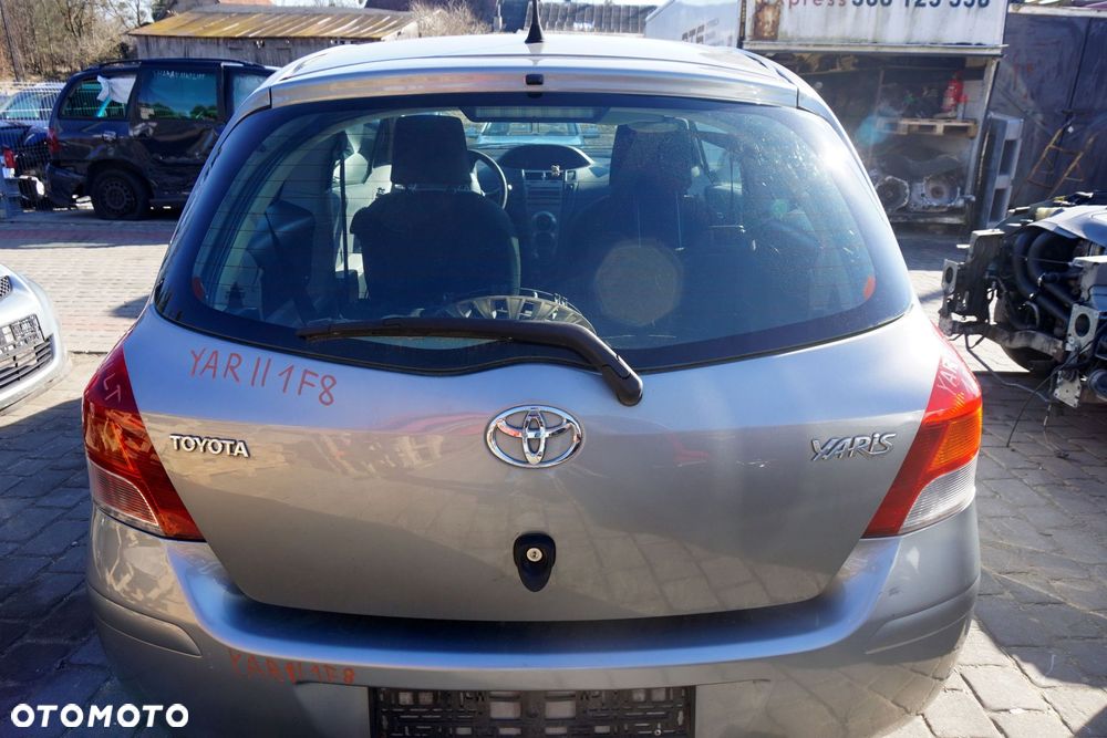 KLAPA BAGAŻNIKA TYLNA YARIS II 3D HB 1F8  SZARY TOYOTA 2005-2009 - 1