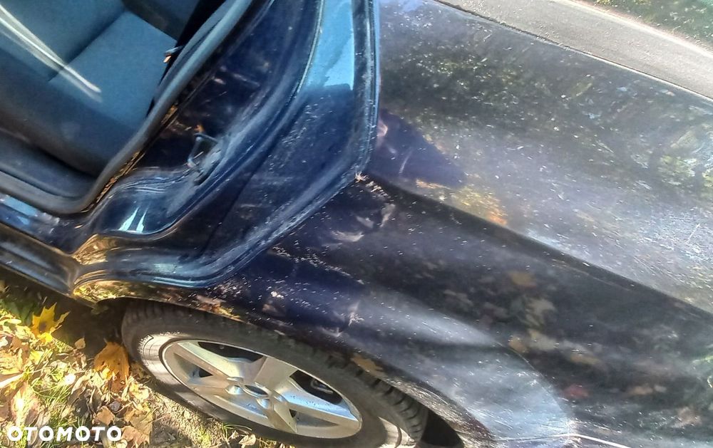 BŁOTNIK TYLNY LEWY FORD MONDEO KOMBI MK IV V 6 - 2