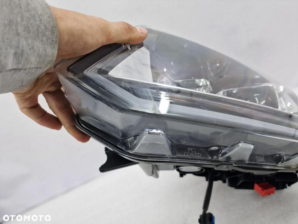 VW AMAROK I LIFT 2H3 16- LEWA LAMPA PRZEDNIA PRZÓD  XENON , NR 2H3941031B , NR AUKCJI LA86 - 10