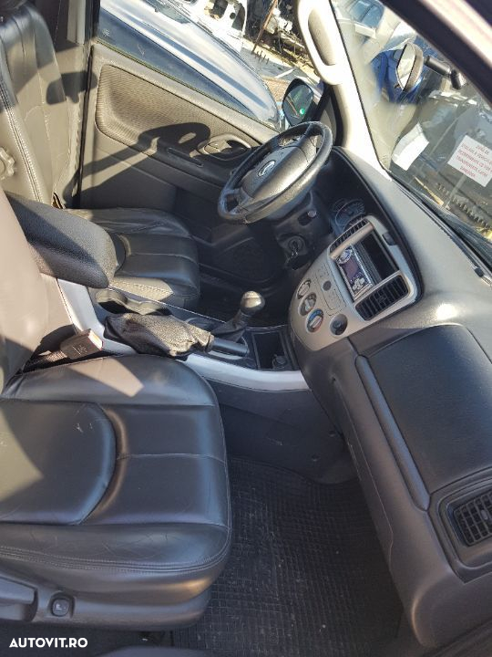 Dezmembrez mazda tribute 2.0 si 2.3 benzina manual - 2