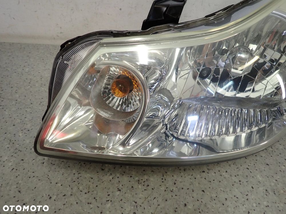 SUZUKI SX4 FIAT SEDICI 06-13 LAMPA PRZEDNIA LEWA REFLEKTOR - 2