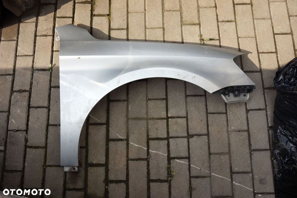 BŁOTNIK PRZEDNI PRAWY PASSAT B7 LA7W  SREBRNY VOLKSWAGEN 2010-2014 - 1