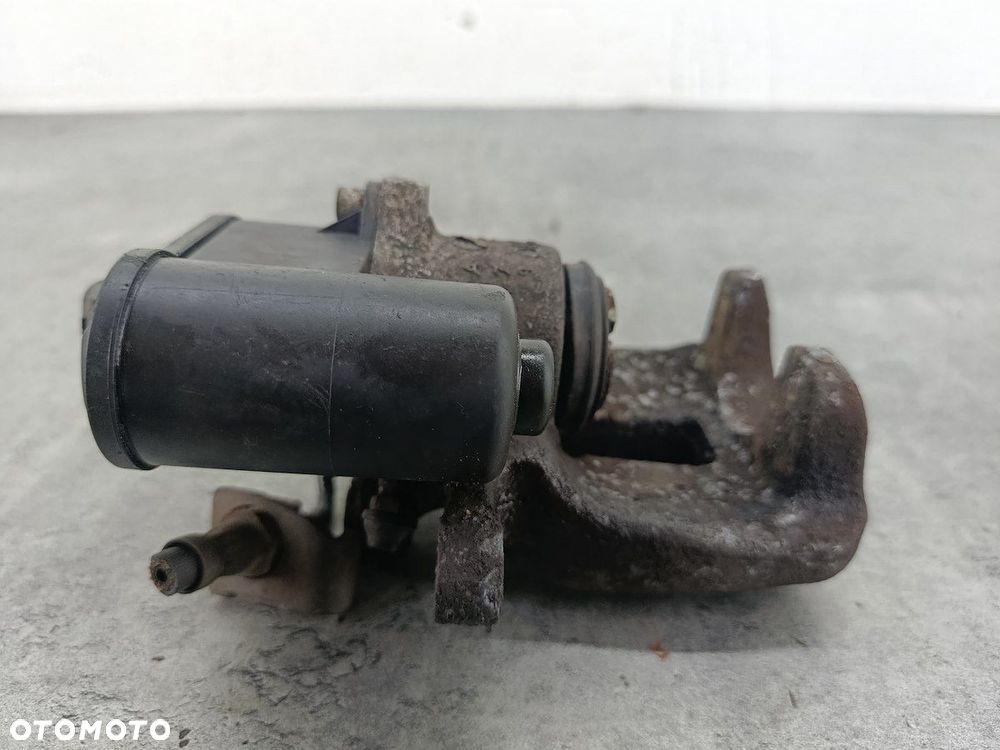 ZACISK HAMULCOWY LEWY TYŁ VW PASSAT B6 32332267 TRW 1.9 TDI - 7