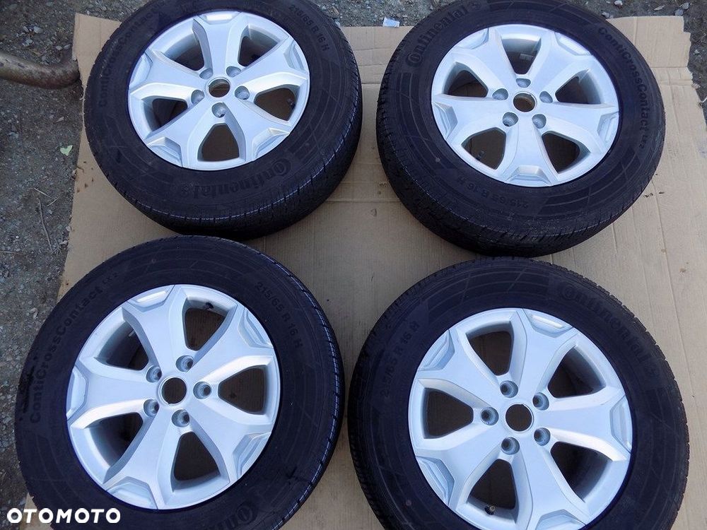 dw duster 2 felgi z oponami continental 215/65r16 - 1