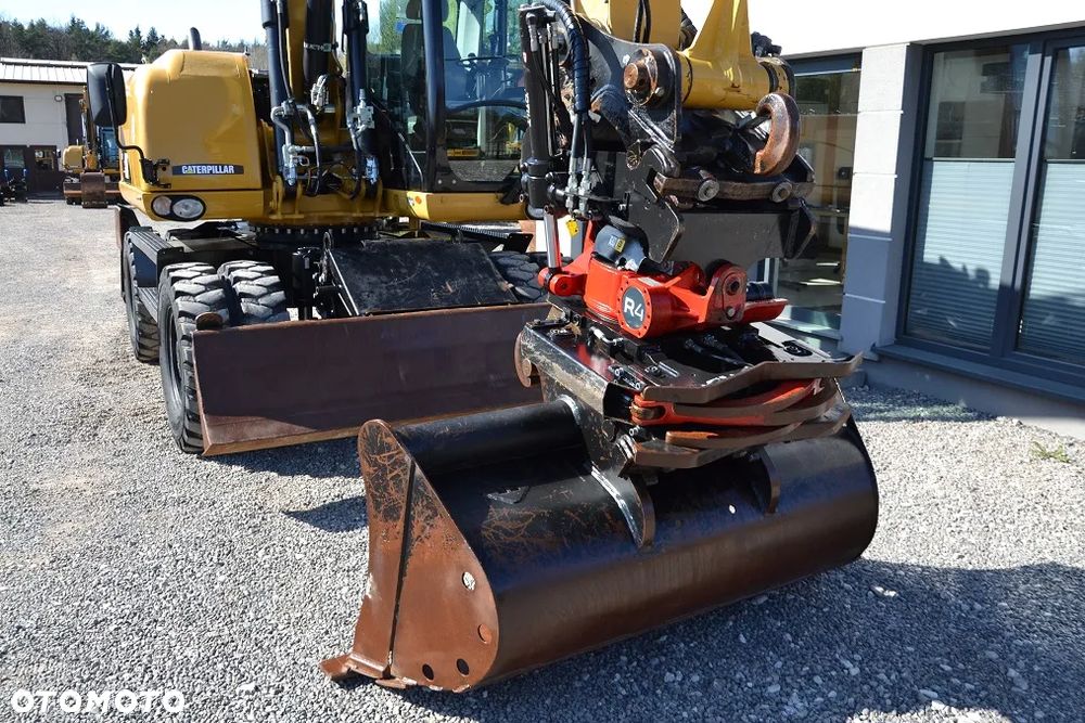 Caterpillar M 313 D, ROTOTILT - 19