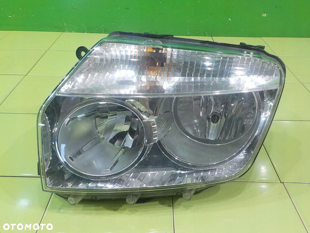 DACIA DUSTER I 09r 5D lampa lewa przod - 1