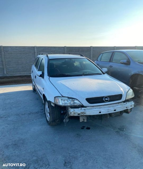 Vas expansiune Opel Astra G  [din 1998 pana  2009] seria wagon 5-usi 1.7 DTi MT (75 hp) - 2
