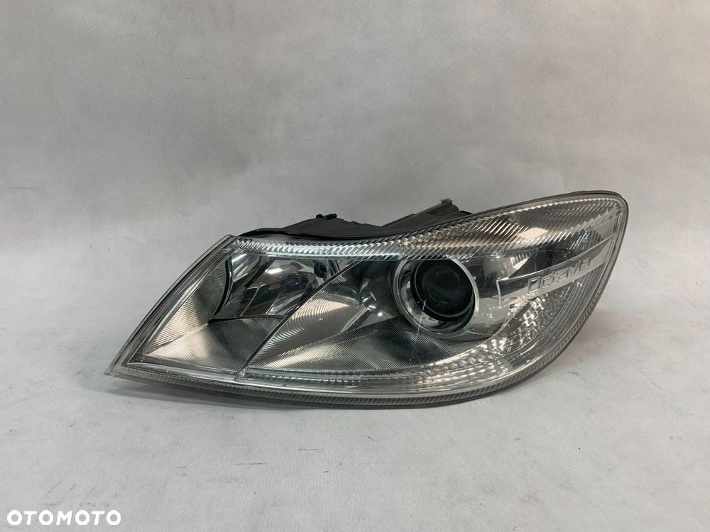 Skoda Octavia 2 II FL 08-12r Reflektor lewy lampa lewa Lift soczewka - 1