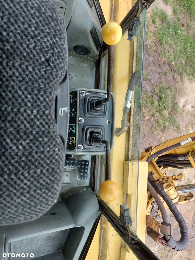 Caterpillar 428D - 11