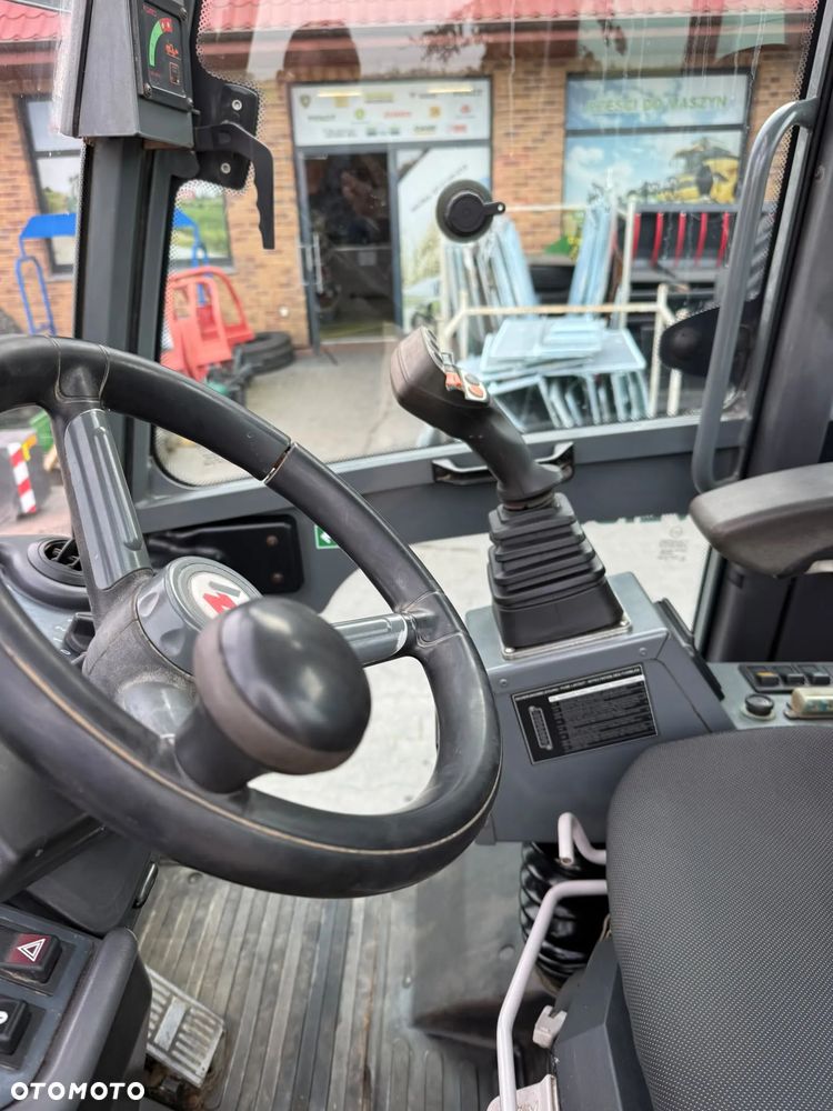 Weidemann 4070  CX 100  SCHAFFER 6390T - 11