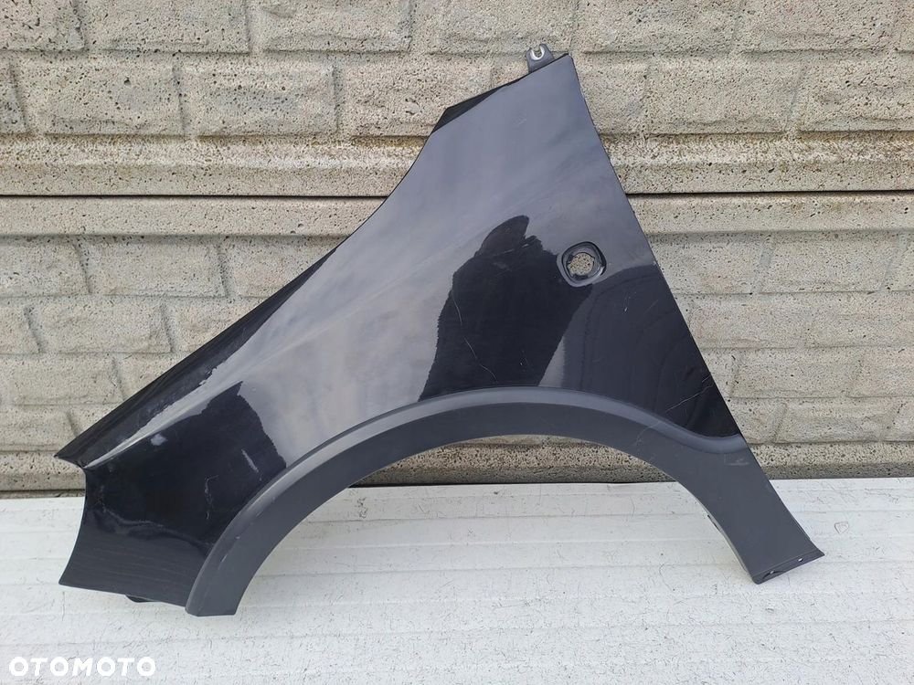 SKODA FABIA SCOUT 4X4 BŁOTNIK PRZEDNI LEWY - 1