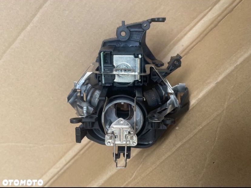 62611913 Soczewka lampy xenon bmw e90 e91 - 4