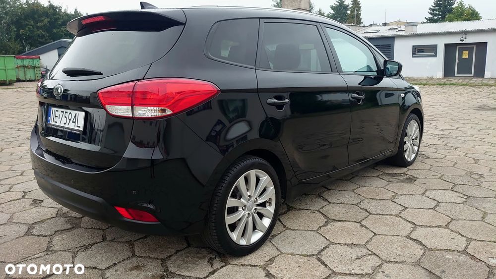 Kia Carens - 4