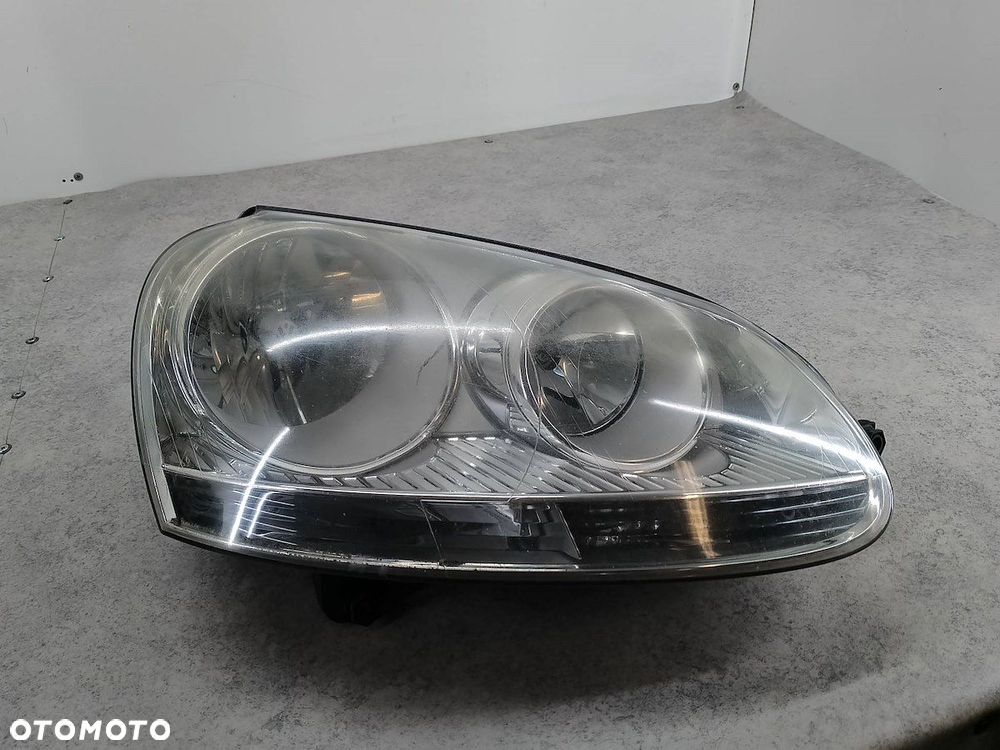 LAMPA PRZÓD PRAWA VW GOLF V 1K6941006P 1EG247007-08  HELLA - 2