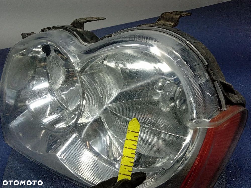 JEEP GRAND CHEROKEE III WK 04- REFLEKTOR LEWY LAMPA 30987 - 7
