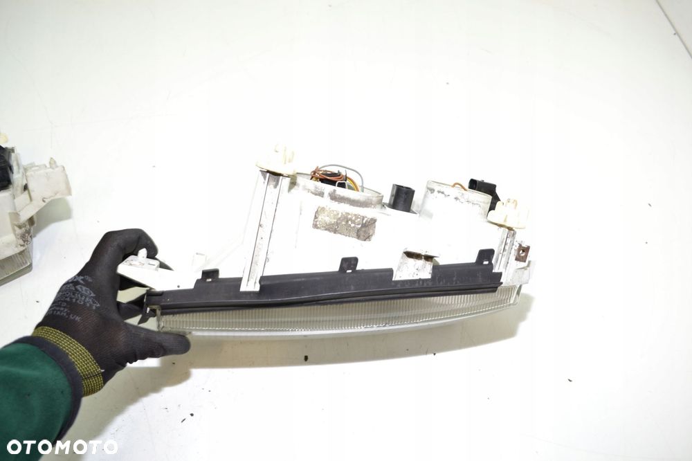 SKODA OCTAVIA I LAMPY PRZÓD REFLEKTORY LEWA PRAWA SOCZEWKA EUROPA 246085-00 - 9