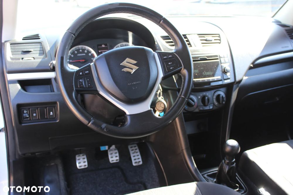 Suzuki Swift 1.2 4x4 Club - 8