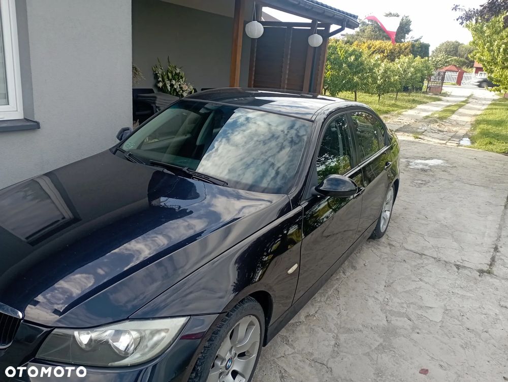 BMW E90 2006 photo 2