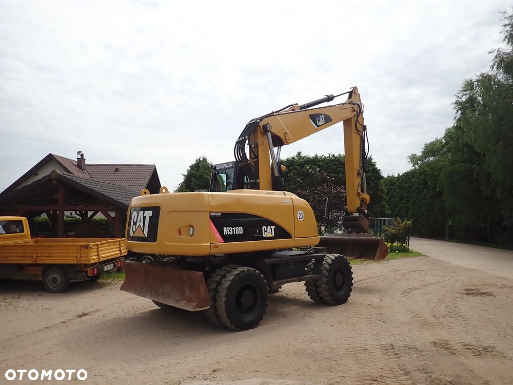 Caterpillar M318D - 8