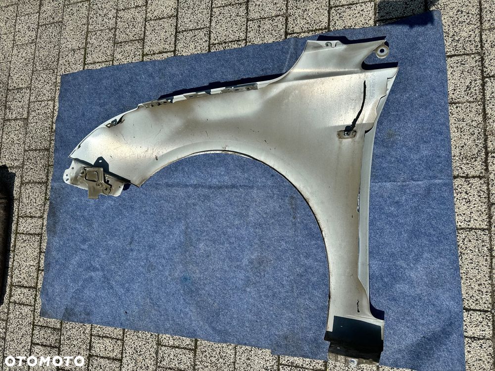 CHEVROLET CRUZE I LIFT GAZ  BLOTNIK PRZOD PRAWY LEWY - 9