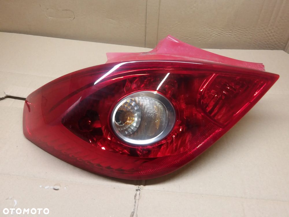 OPEL CORSA D 3D 06-10 LAMPA PRAWA LEWA TYŁ TYLNA 13186350 - 2