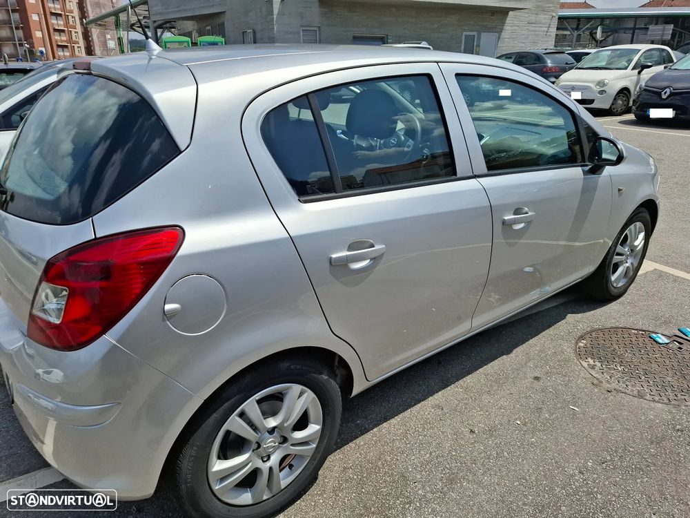 Opel Corsa 1.2 Enjoy - 1