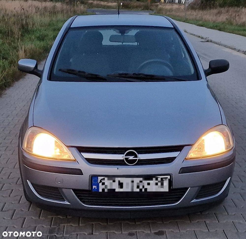 Opel Corsa 1.0 12V Cosmo - 1