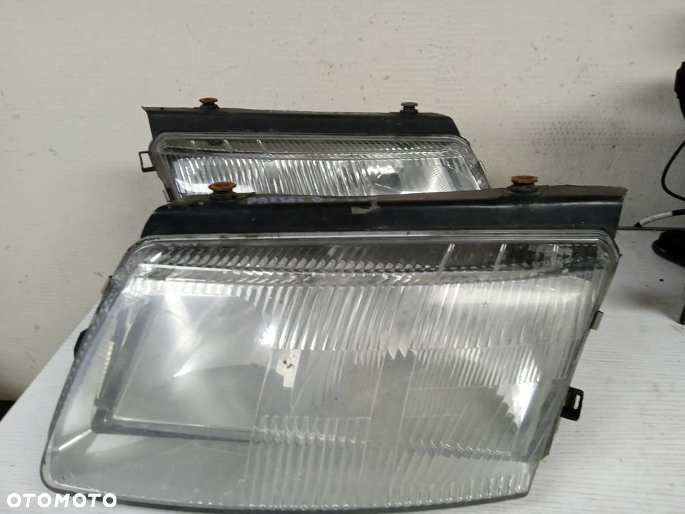 REFLEKTOR VW PASSAT B5 96-00 LEWY - 1