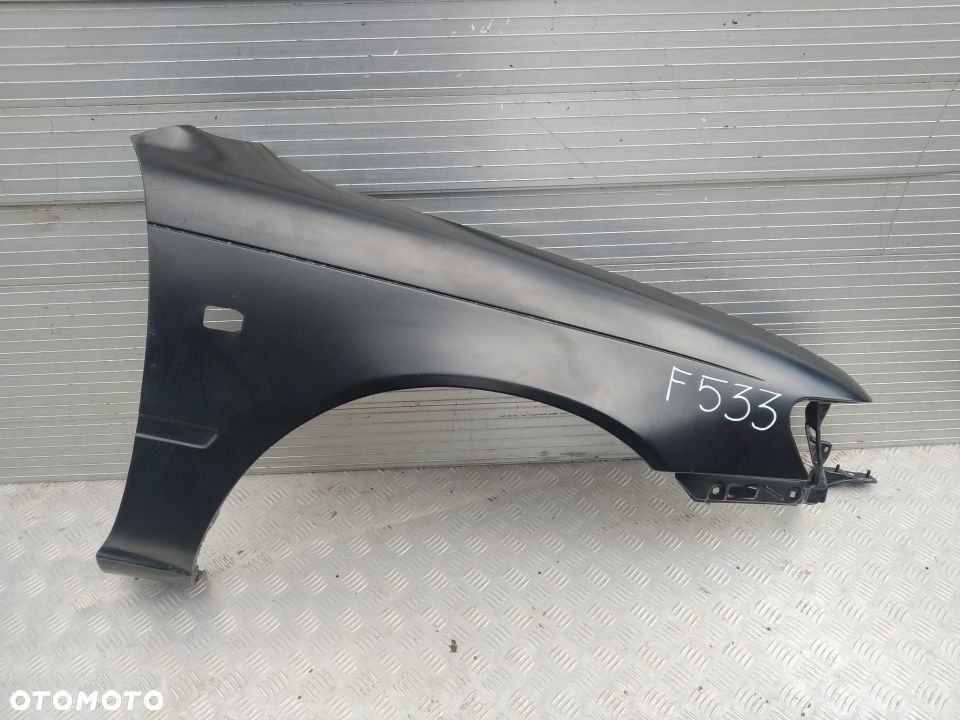 F533 PRAWY BŁOTNIK TOYOTA COROLLA KOMBI SEDAN HB 1993- 99 - 1