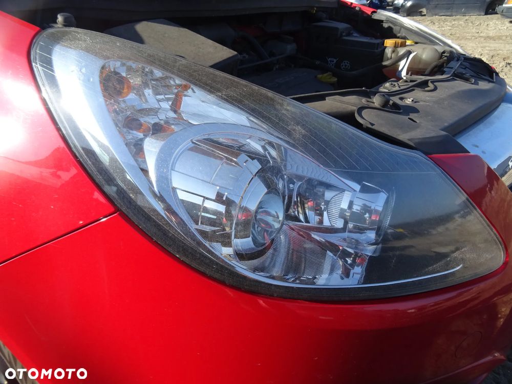 Opel Corsa D lampa reflektor prawy przód soczewka skrętna - 2