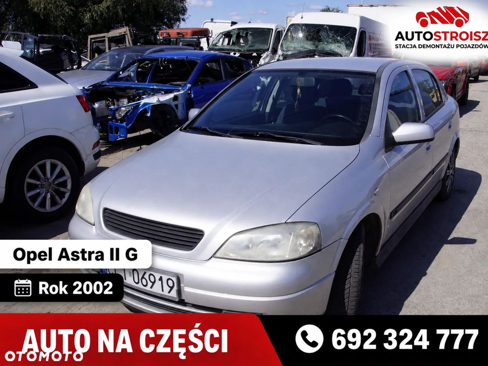 Auto na części - Opel Astra II G 1.6 16V 101 KM Z16XE F17 Z157 2002R Silnik Skrzynia Drzwi Maska Błotnik Zderzak Klapa Lampa Lusterko Klamka Szyba Deska Kokpit Sterownik Moduł Czujnik Licznik Panel Kierownica - 1
