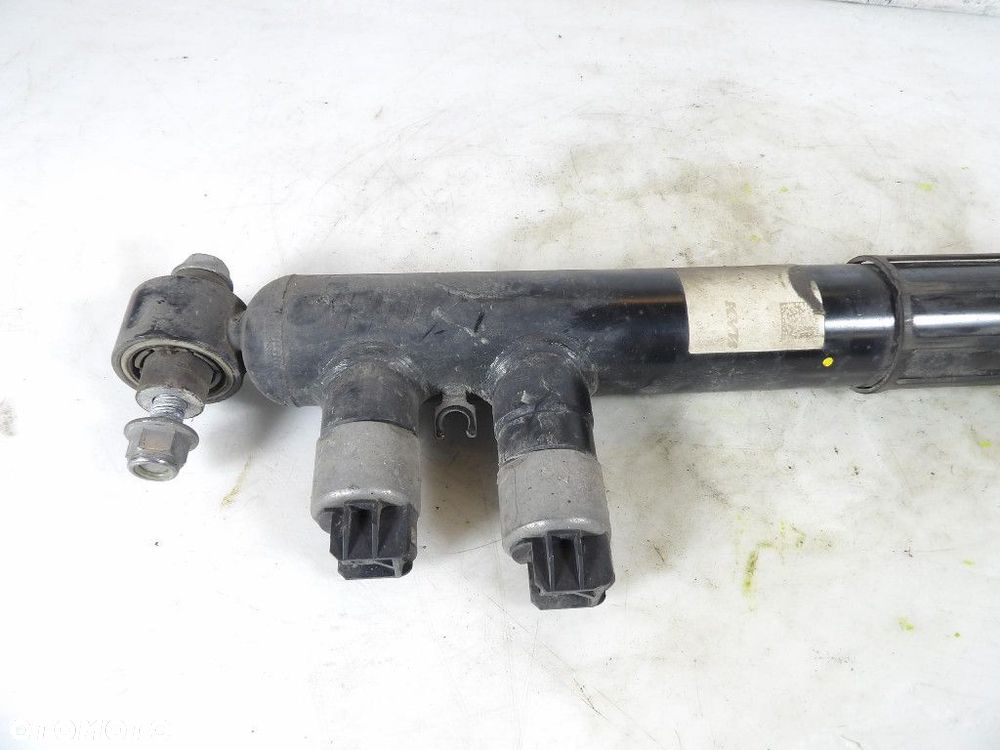 SKODA SUPERB IV 4 KOMBI AMORTYZATOR TYŁ LEWY KYB-0301-100-218 - 2