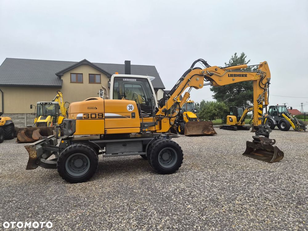 Liebherr A 309 Litronic - 3