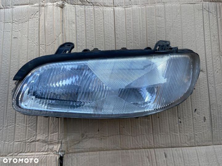 Lampa przednia lewa reflektor Opel Omega B Europa - 1