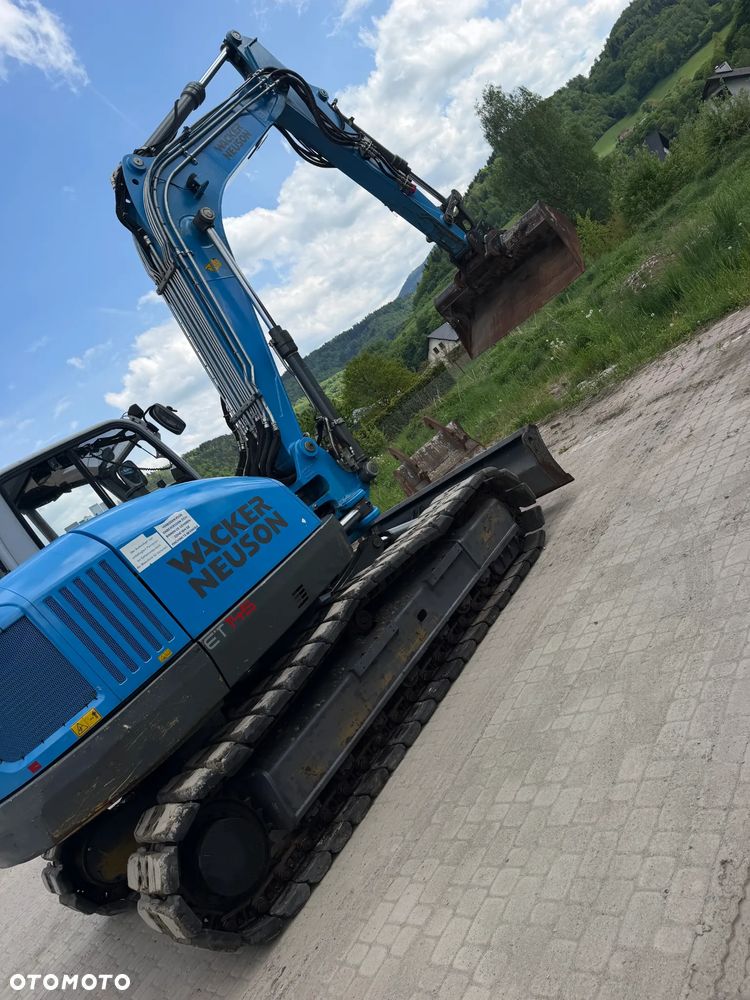 Wacker Neuson ET145 Koparka Gąsienicowa 15 ton. Maszyna jak Nowa 2018 rok. 3400Mtg silnik PERKINS. Maszyna Pełny Oryginał. Aktualna DEKRA BMWT oraz aktualne serwisy Eksploatacyjne! Sprowadzona z Norwegii, KLIMA, KAMERY, własna pompa tankowania, Nagłośnienie, Zero luzów i wycieków! OKAZJA. Szybkozłącze Hydrauliczne. Skrętne ramię. Dodatkowe linie hydrauliczne! 2 łyżki - 2