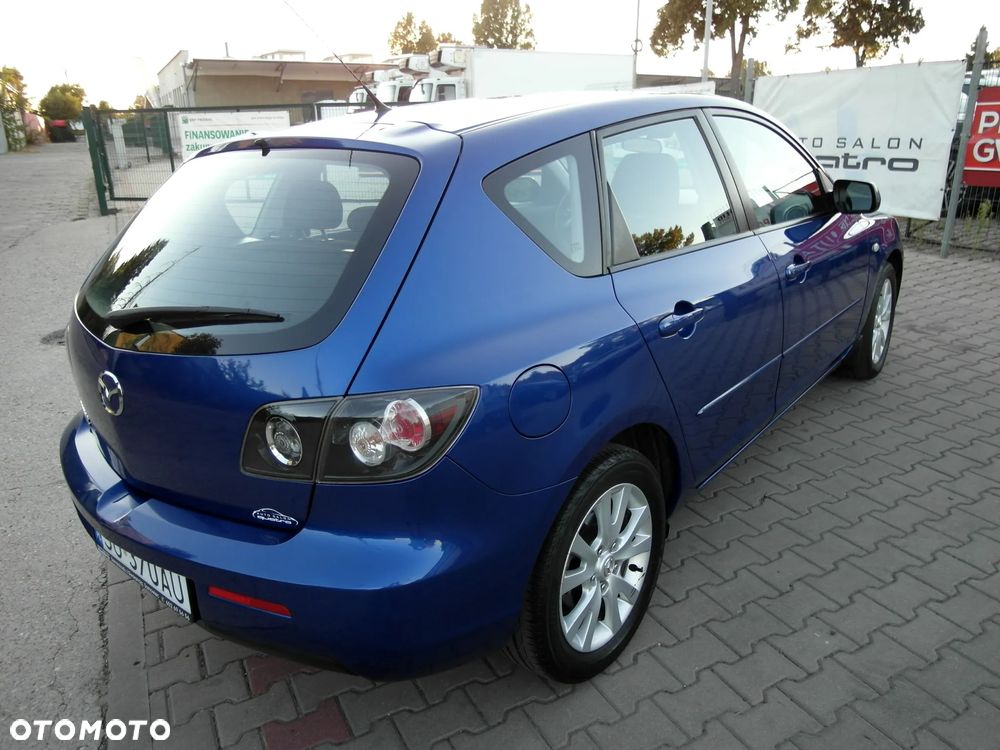 Mazda 3 1.6 Sport Exclusive - 11