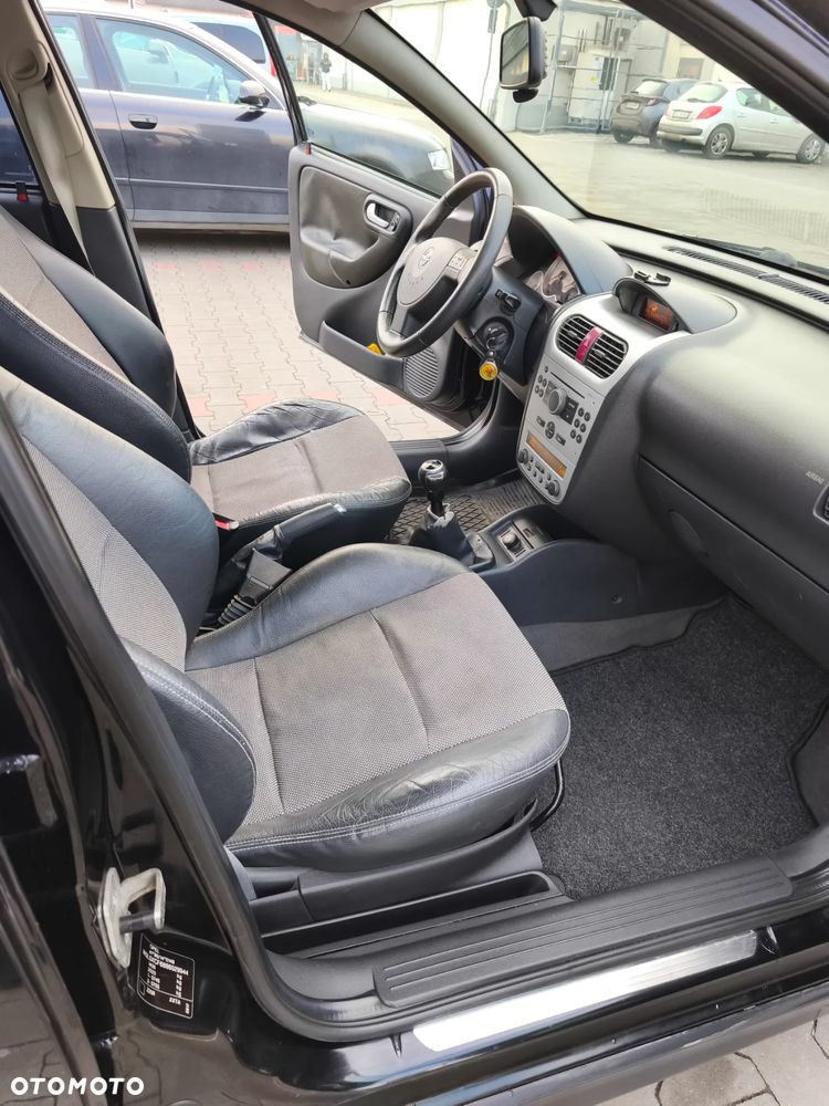 Opel Corsa 1.0 12V Cosmo - 10