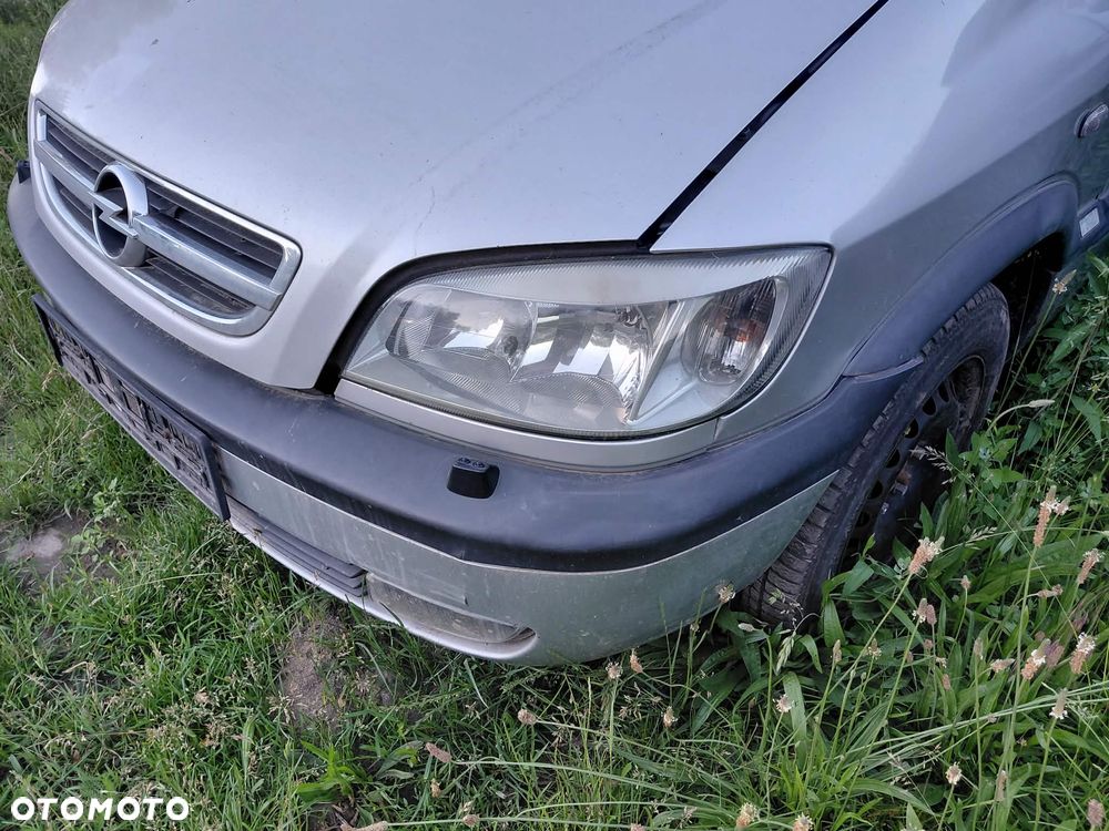 części OPEL ZAFIRA A 1.8 16V 2004r LAMPY PRZÓD Z157 - 2