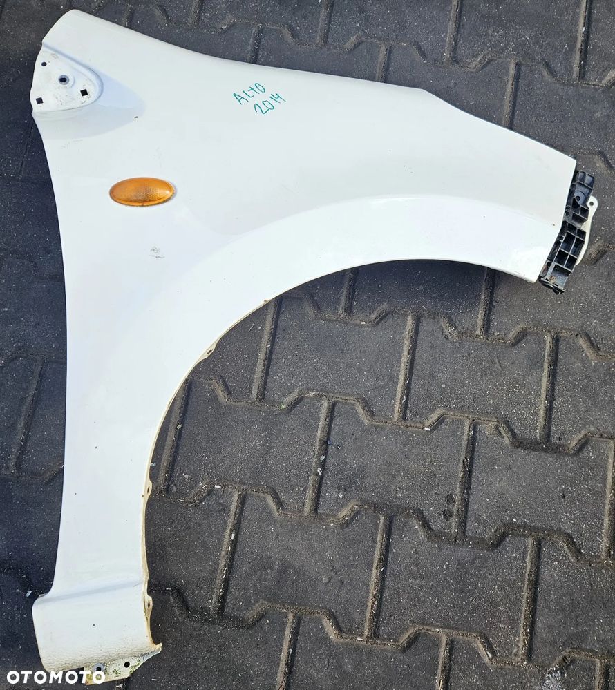 Suzuki Alto 2014r Błotnik przód przedni prawy lewy