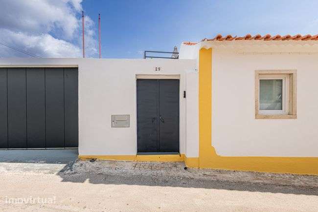 MORADIA T2 + QUINTAL + TERRAÇO – TOTALMENTE REMODELADA CENTRO CARTAXO - Grande imagem: 3/27